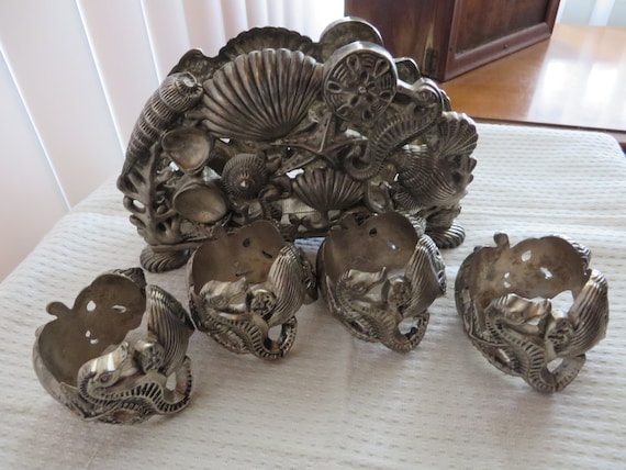 Four Silverplate Napkin Rings Brass Seashell Decoration Vintage