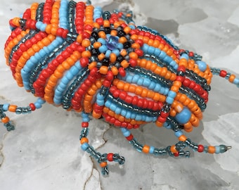 The Sacred Scarab Beetle of Ancient Egypt was Symbolic of the Cycle of Rebirth or Regeneration A Fantasy Good Luck Charm in Glass Seed Beads