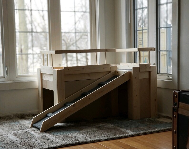 The juniorwood Raised Dog Bed With Ramp and Dog House Elevated Dog Bed