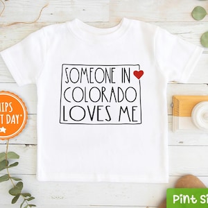 Someone In Colorado Loves Me Kids Shirt - Colorado Kids Shirt -  Loved Shirt - Long Distance Kids Gift - State baseball tee
