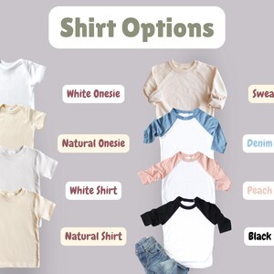 a bunch of shirts that are on a table
