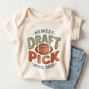 May include: A rustic wooden sign with the text "Welcome to our home" in white lettering. The sign features a distressed finish and a simple, inviting design, perfect for entryway decor.