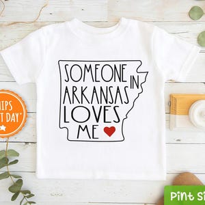 Someone In Arkansas Loves Me Shirt - Arkansas Kids Shirt -  Loved Toddler Shirt - Long Distance Kids Gift - State Baseball Tee