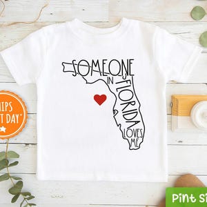 Someone In Florida Loves Me Shirt® - Florida Kids Shirt® -  Loved Toddler Shirt® - Long Kids Gift - State Baseball Tee