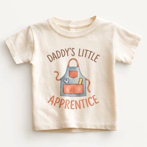 May include: A rustic wooden sign with the text "Welcome to our home" in a handwritten style. The sign features a distressed finish and a simple, inviting design, perfect for a front porch or entryway.