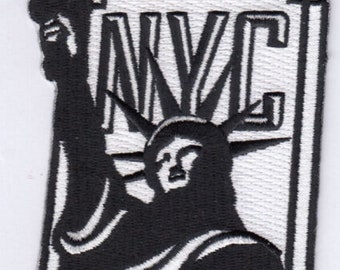 May include: Black and white embroidered patch featuring the Statue of Liberty and the text "NYC".