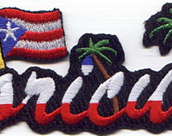 May include: Embroidered patch with the word "Bahamas" in white lettering on a black background. The word is outlined in red and blue, and there are palm trees and a flag of Puerto Rico on either side.