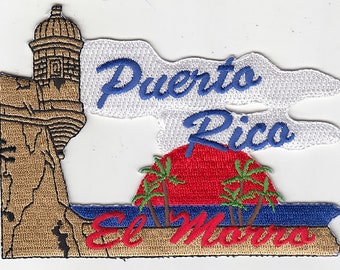 May include: Embroidered patch featuring a depiction of Puerto Rico. The design includes the words "Puerto Rico" in blue script, a red sunset, palm trees, and the words "El Morro" in red script. A tan fort is on the left.