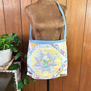 May include: A rustic wooden sign with the text "Welcome to our home" in white lettering. The sign features a distressed finish and a simple, inviting design, perfect for a front porch or entryway.