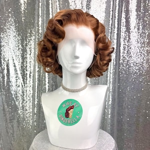 May include: A rustic wooden sign with the text "Welcome to our home" in white lettering. The sign features a distressed finish and a simple, inviting design, perfect for a front porch or entryway.