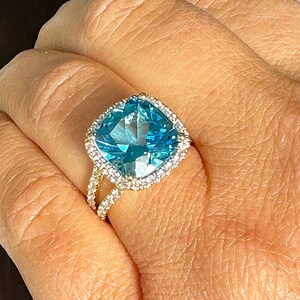 Cushion Cut Natural Blue Topaz And Round Cut Sides Simulated Diamonds Engagement Ring Halo Wedding Anniversary 14K Solid Yellow Gold 4.65ctw