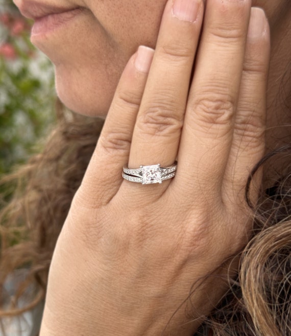 At Auction: A diamond and 14k white gold wedding set