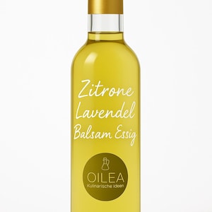 May include: A glass bottle of lemon lavender balsamic vinegar with a gold cap and label. The label reads "Zitrone Lavendel Balsam Essig" and features a logo for "Oilea Kulinarsiche Ideen".