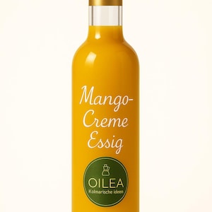 Op de afbeelding: Een glazen fles mango-room azijn met een gouden dop en een groen etiket met de tekst "Mango-Creme Essig" en "Oilea Kolmarische ideen".