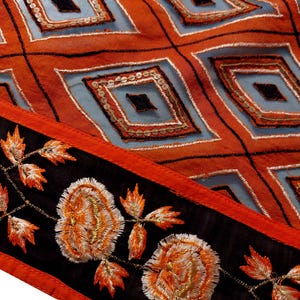 Add a touch of elegance to your ethnic wardrobe with this stunning handmade dupatta, crafted by skilled artisans from India. This exquisite piece showcases a bold diamond pattern.