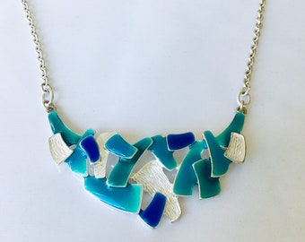 Metal and enamel necklace