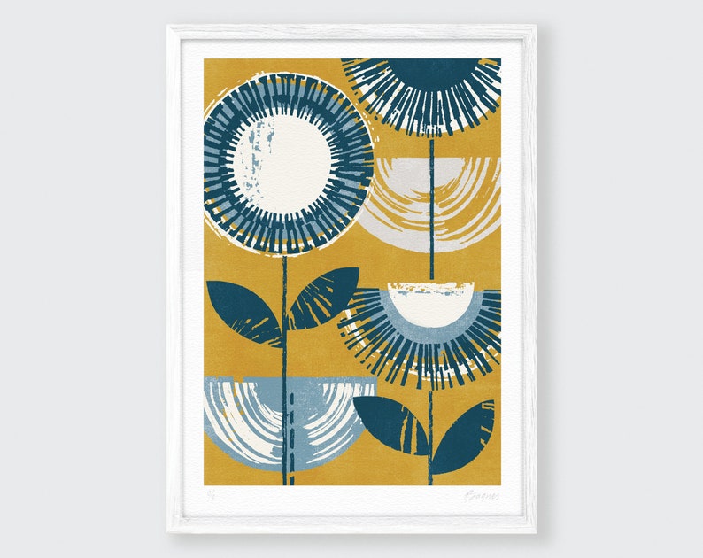 May include: Abstract art print featuring stylized blue and white flowers on a yellow background. The print is framed in white.