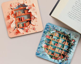 May include: Two square coasters with a 3D bookshelf design. One coaster has a peach background with floral accents, the other has a blue background. Both feature a bookshelf filled with books, creating a unique decorative item.