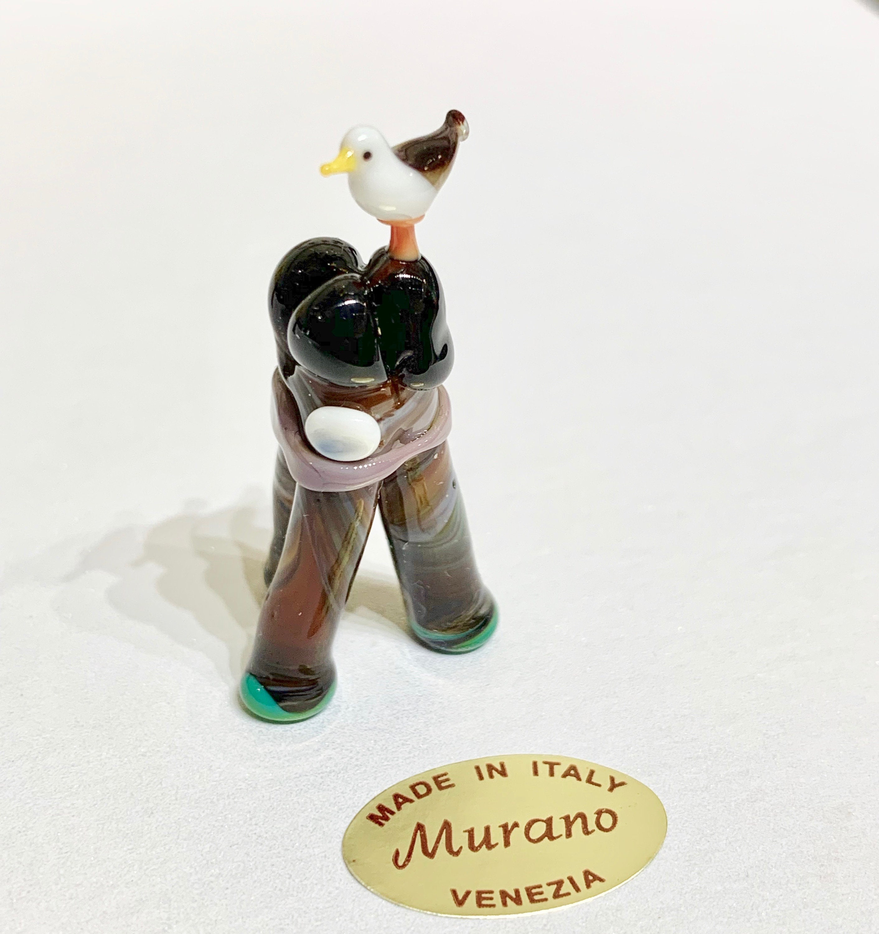 Seagull in the Venetian Lagoon, on the Bricole, typical wodden poles of Venice. Murano glass figurine souvenir by Umberto Ragazzi.