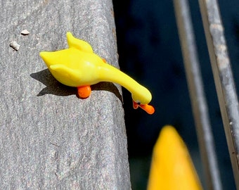 Micro glass duck or goose for staging a scene in a display cabinet. To glass figurines collectors, miniatures, statuettes, small sculptures