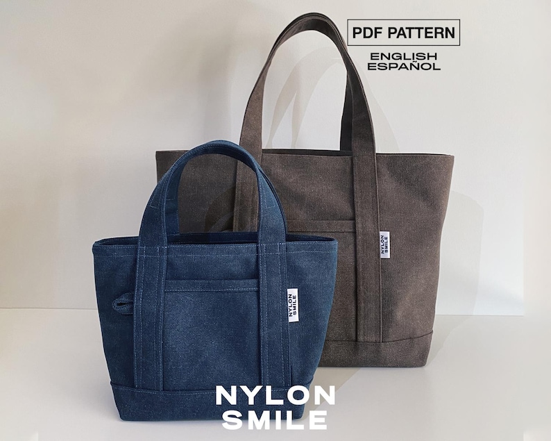 May include: Two tote bags in dark blue and dark gray, each featuring two top handles, a front pocket, and a small white label with the text NYLON SMILE. The image includes the text PDF PATTERN ENGLISH ESPA&Ntilde;OL and NYLON SMILE at the bottom.