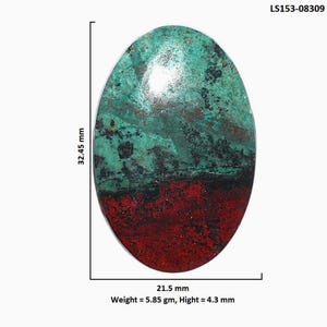 May include: An oval-shaped cabochon gemstone featuring a dual-tone surface of teal-green and deep red with black inclusions. The stone measures 32.45 mm by 21.5 mm with a height of 4.3 mm and a weight of 5.85 grams. Labeled with code LS153-08309.