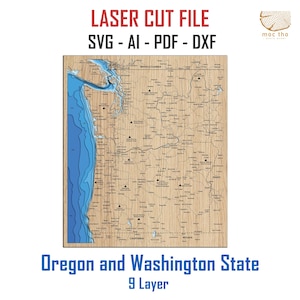 May include: A wooden laser-cut map of Oregon and Washington State, featuring a detailed depiction of the states' topography and coastlines. The map includes the text "LASER CUT FILE" and "Oregon and Washington State 9 Layer". The map is a light brown color with blue accents.