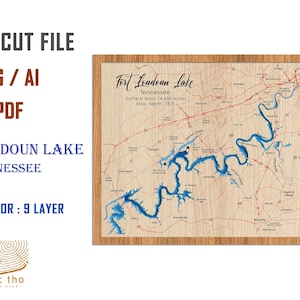 May include: A laser cut file of Fort Loudoun Lake in Tennessee. The map shows the lake's shape, surrounding roads, and a compass rose. The file is available in SVG, AI, and PDF formats and includes 9 layers.