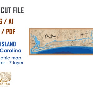 May include: Laser cut file of a bathymetric map of Oak Island, North Carolina. The map is in a wooden frame and shows the coastline, inlets, and surrounding land. The text "Oak Island, Brunswick County, NC" is visible on the map. The file is available in SVG, AI, DXF, and PDF formats. The file is a vector file with 7 layers.
