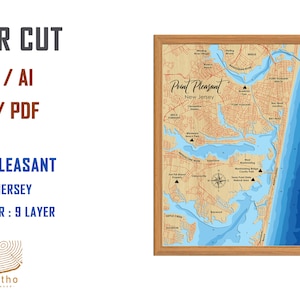 Puede incluir: Mapa de Point Pleasant, Nueva Jersey, cortado con láser, con un marco de madera. El mapa está en un estilo en capas, con diferentes tonos de azul que representan las profundidades del océano. El mapa incluye el texto "Point Pleasant, New Jersey".