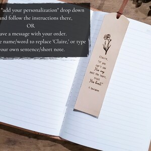 May include: A brown leather bookmark with a floral design and a quote that reads "Claire, If you can't see His way past the tears, trust His heart." - C. Spurgeon.