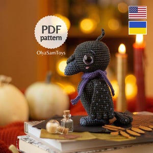 May include: A white ceramic mug with a black handle and the text "But First, Coffee" in a bold, black font. The mug is set against a neutral background, highlighting its simple design.