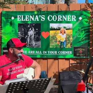 May include: A green sign with the text "Elena's Corner" and two smaller images. The left image shows a person lifting weights. The right image shows a woman standing in a field of flowers. The text "We are all in your corner" is below the images. A man is playing a guitar in front of the sign.