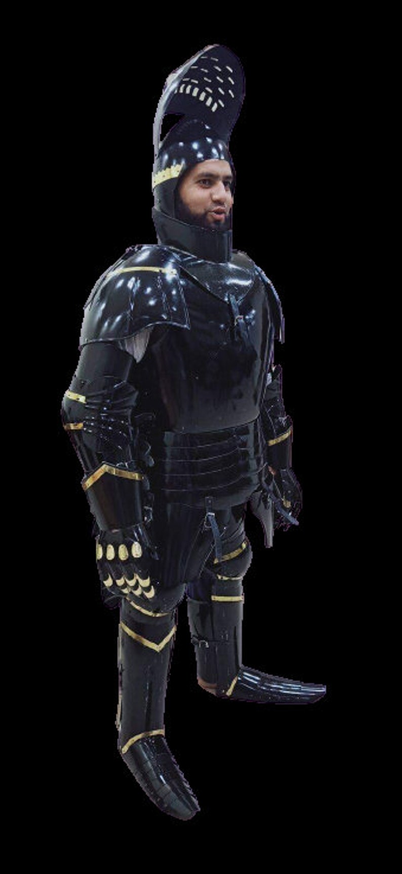 May include: A black knight's armour with gold accents. The armour includes a helmet, breastplate, gauntlets, and leg armour.
