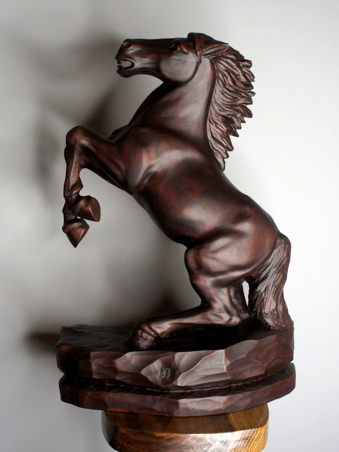 large wooden horse sculpture