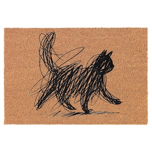 May include: A rectangular doormat with a brown background and a black scribble drawing of a cat. The cat is depicted in a walking pose, with its tail raised. The design is simple and modern.