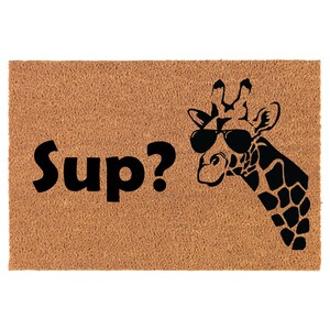 May include: A brown coir doormat with the text "Sup?" in black lettering and a black silhouette of a giraffe wearing sunglasses.