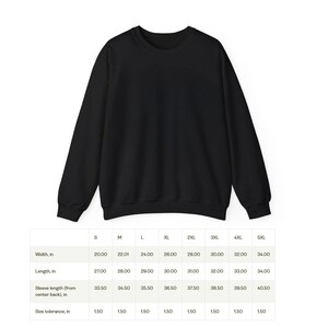 May include: A size chart for a black sweatshirt with measurements in inches for width, length, sleeve length, and size tolerance.