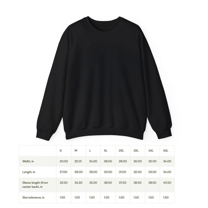 May include: A size chart for a black sweatshirt with measurements in inches for width, length, sleeve length, and size tolerance.