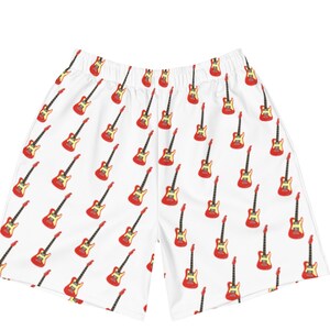 May include: White athletic shorts with a red electric guitar pattern.