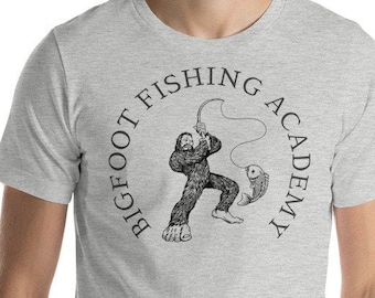 Bigfoot Fishing shirt, Sasquatch fishing t shirt. Short-Sleeve Unisex T-Shirt with Fisherman fishing Academy