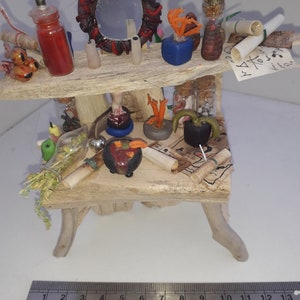 1/12th scale dolls house miniature witchy sideboard made from driftwood with plenty of items
