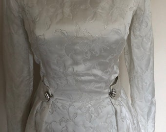 Stunning 1950's brocade long sleeve wedding dress with a duster train