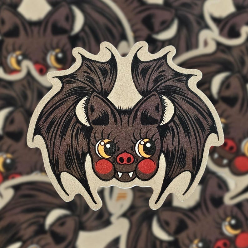 May include: A brown bat with large, black wings and big, round eyes. The bat has a small, pink nose and a toothy grin. The bat is drawn in a cartoon style and has a whimsical, cute appearance.