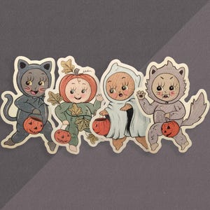 Pegatinas vintage de muñeco Kewpie para Halloween, truco o trato, lindas calcomanías para computadora portátil, regalo para amantes de Halloween, calcomanía de vinilo retro, arte de tatuaje flash