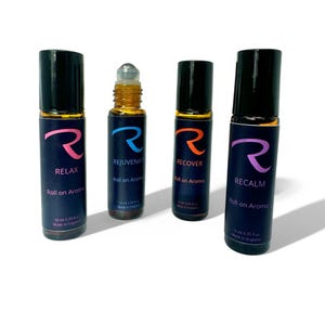 May include: Four 10 ml roll-on essential oil bottles with black caps and labels. The labels feature a stylized letter 'R' and the words 'RELAX', 'REJUVENATE', 'RECOVER', and 'RECALM'. Each bottle says 'Roll on Aroma' and 'Made in England'.