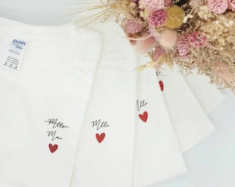 vit t-shirt med litet personligt hjärta