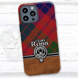 May include: A red, green, and blue plaid phone case with a wood-grain design. The case features a silver clan crest with the text "Clan Ross" and "Spem Successus Alit".