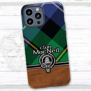May include: A green, blue, and black plaid phone case with a silver clan crest and the text "clan MacNeil" in black. The case has a wood-grain pattern on the bottom half.