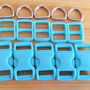 May include: A set of 6 light blue plastic side release buckles and 6 silver metal D-rings. The buckles are 1 inch wide and the D-rings are 1 inch in diameter.